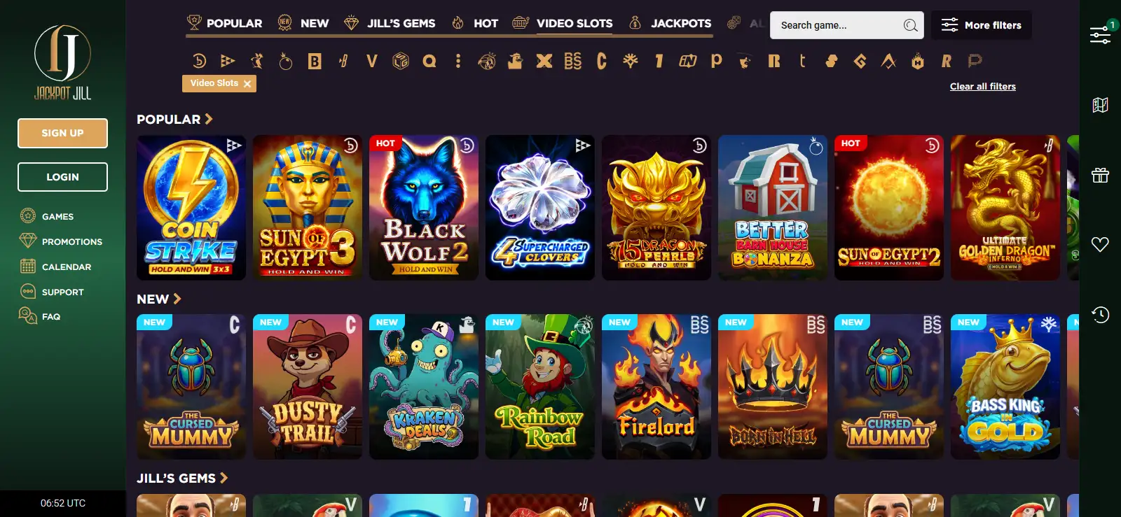 A neutral desk scene with a laptop, phone, payment cards and abstract casino-game tiles